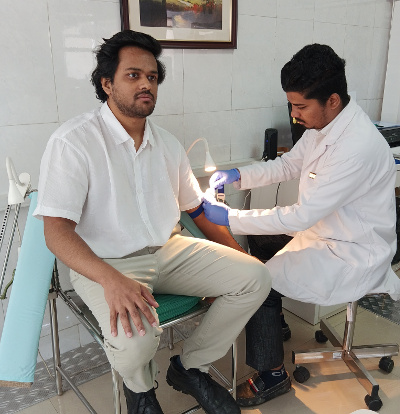 A blood sample being collected for HBA1C test at Pathofast Lab in Pune,Camp